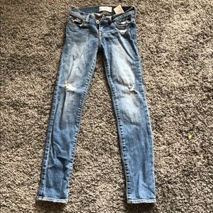Abercrombie  kids (girl) distressed jeans.
